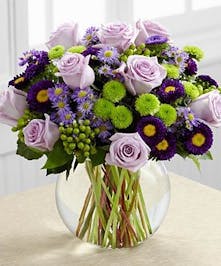 Lavender roses, monte casino asters and hypericum 