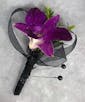 Elegant Orchid Boutonniere